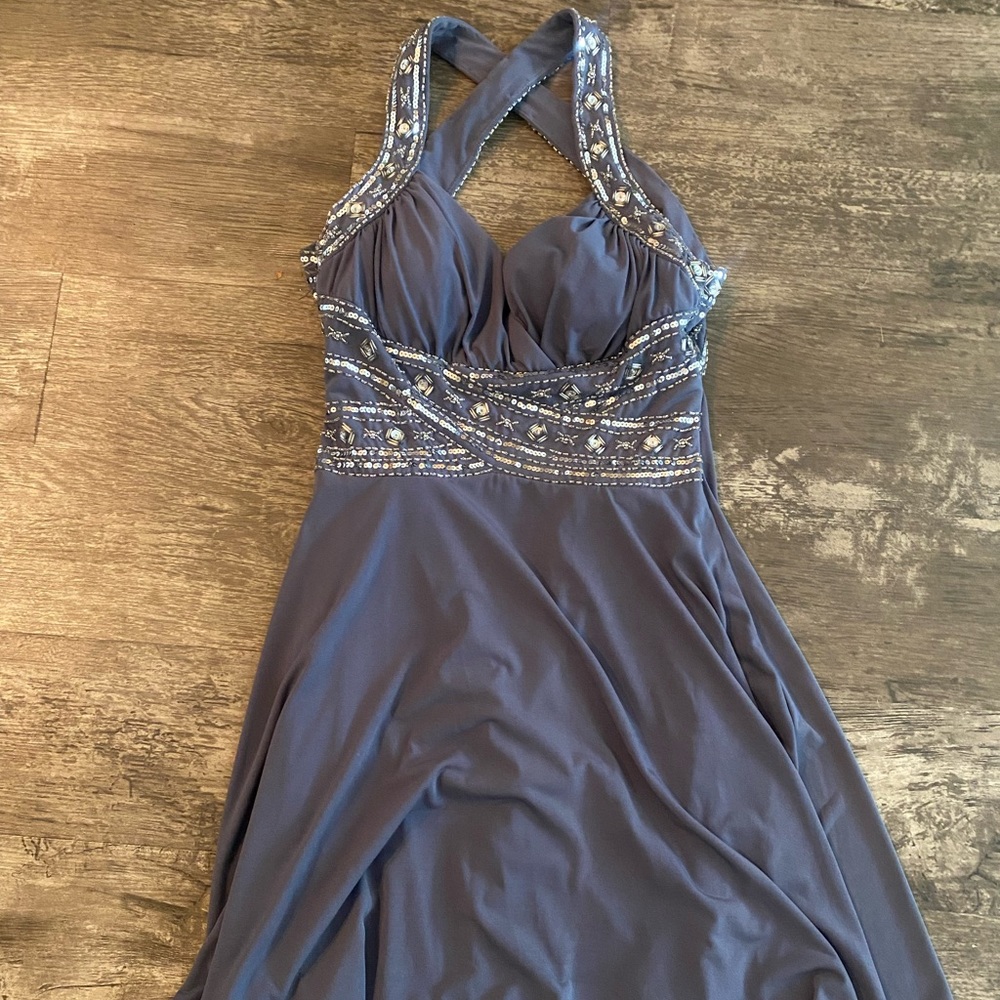 Above the knee dress with beading and cross back!